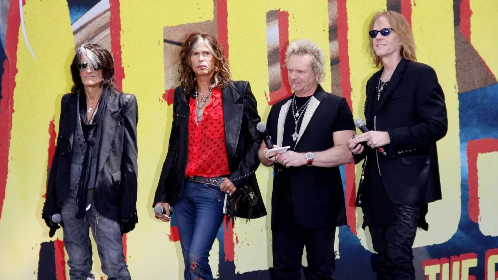 Steven Tyler^ Joey Kramer^ Joe Perry and Tom Hamilton at the Aerosmith "The Global Warming" Tour Press Conference held at the Grove in Los Angeles^ USA on March 28^ 2012.