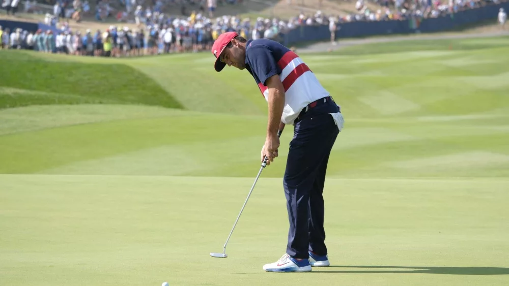 Scottie Scheffler (Team USA) putts on the 1st green during the Sunday singles of the Ryder Cup 2023. Rome^ Italy - September 30 2023