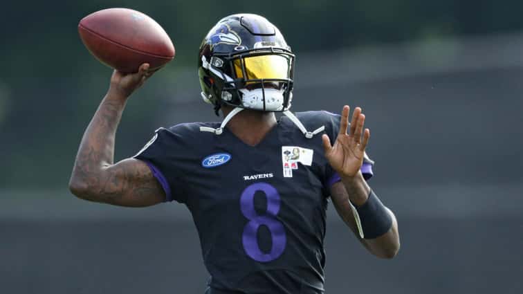 VIDEO: Ravens feel sense of 'normalcy' with first practice day with full  pads