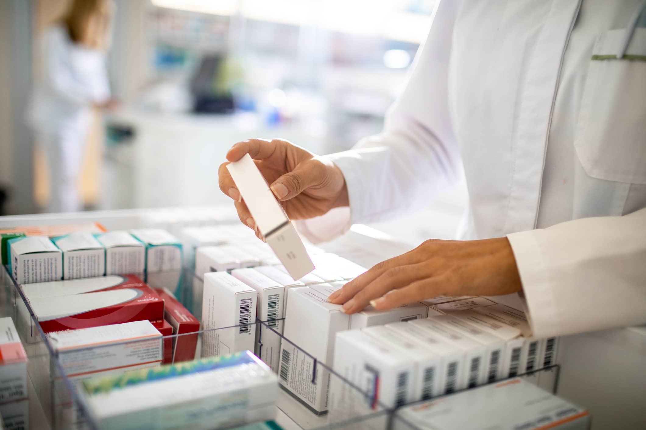 pharmacist-organizing-the-medicine-drawer