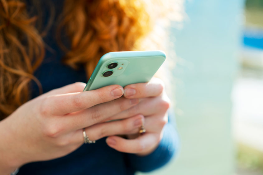 close-up-or-woman-using-smart-phone