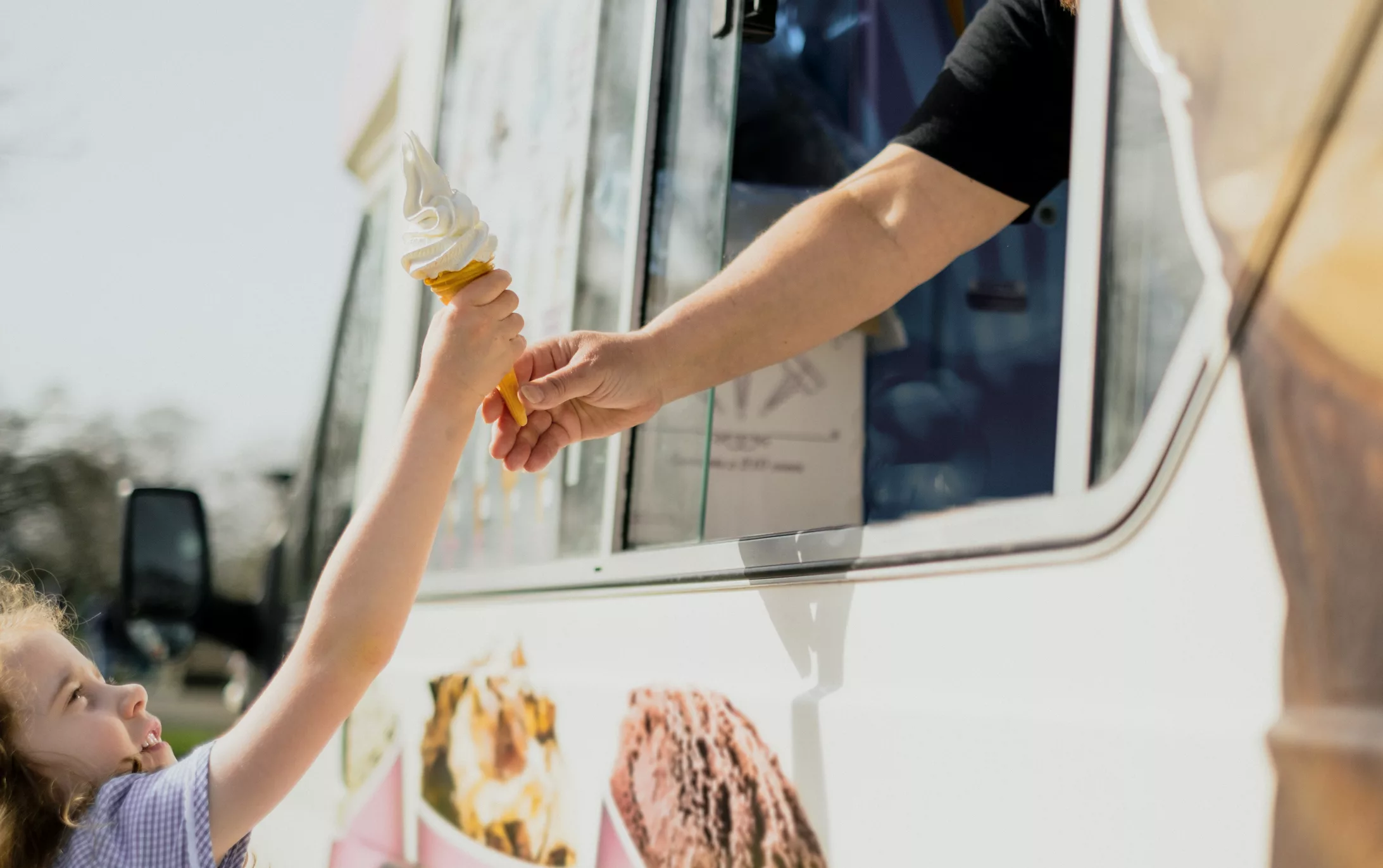 a-happy-little-girl-getting-ice-cream