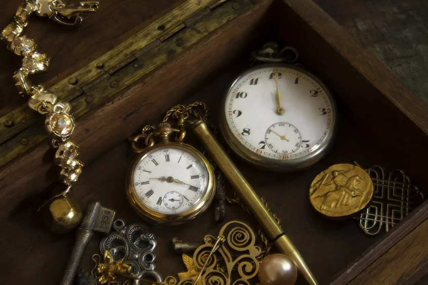 two-old-pocket-watches-inside-a-box-still-life