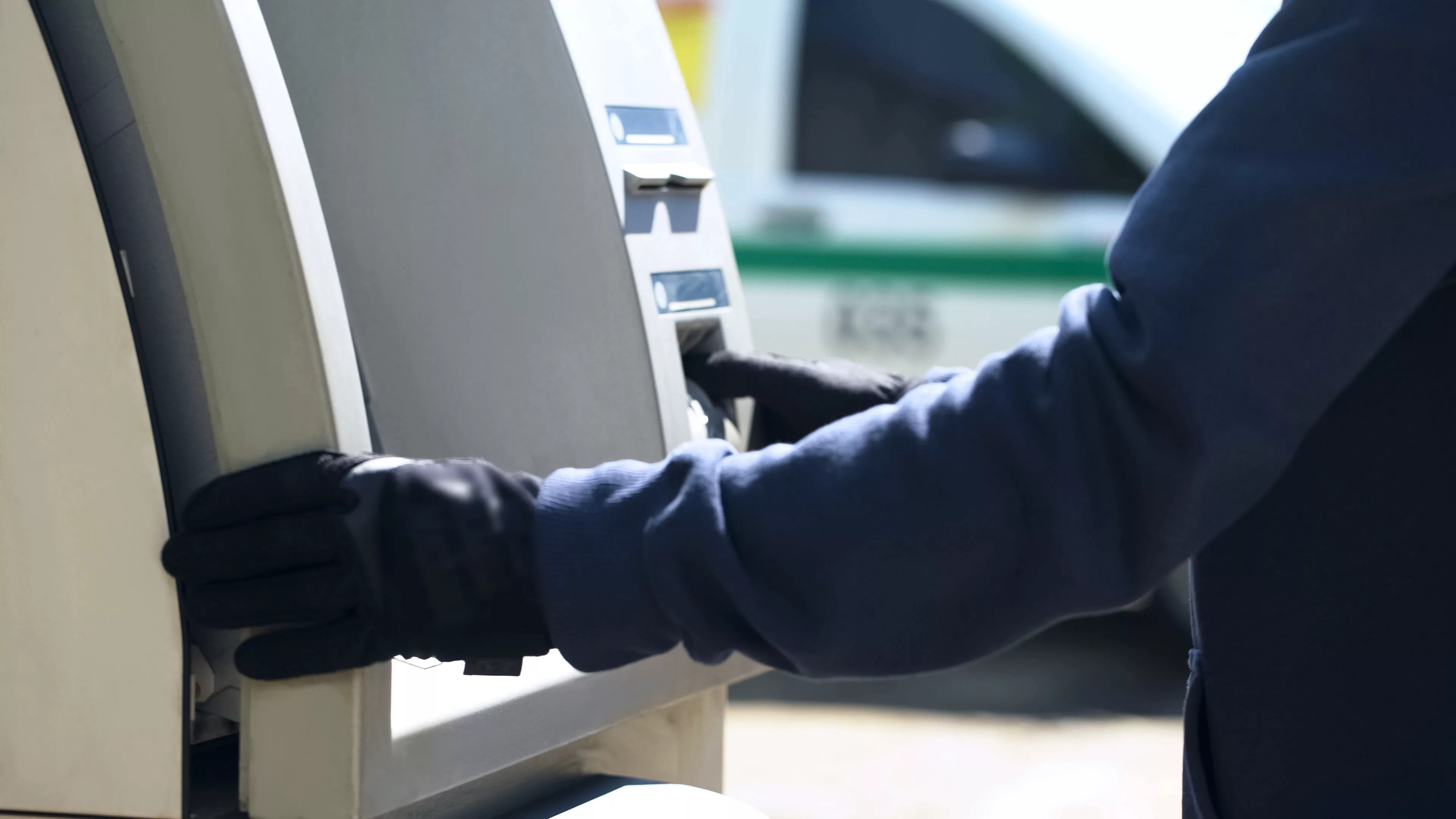 technical-support-security-man-checking-safety-of-automated-teller-machine