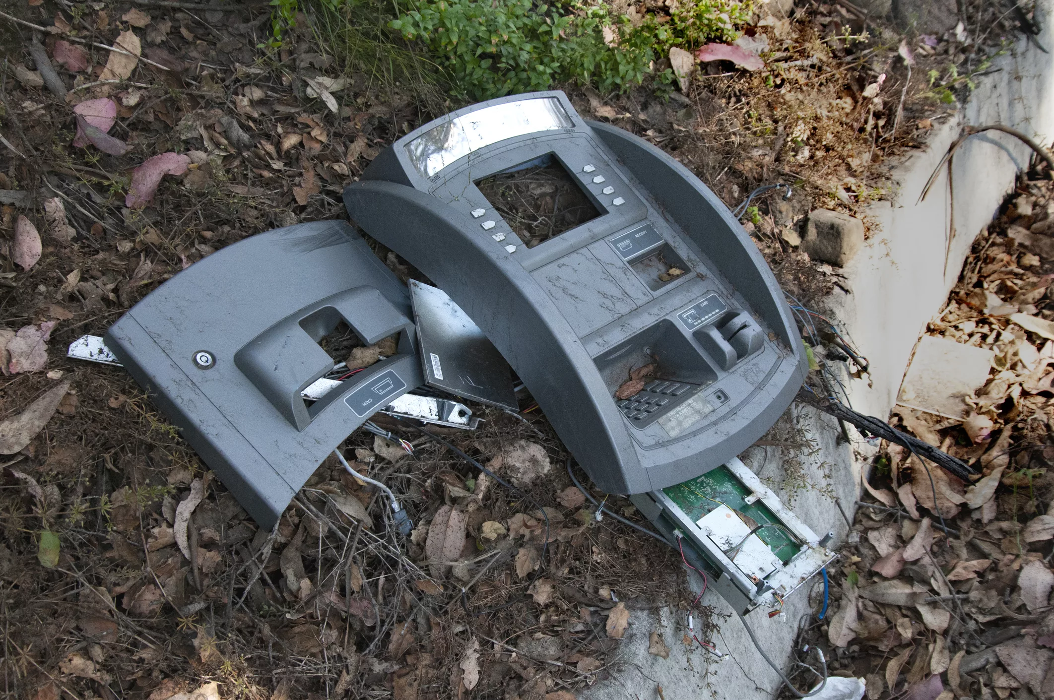 trashed-atm-machine-by-the-side-of-the-road