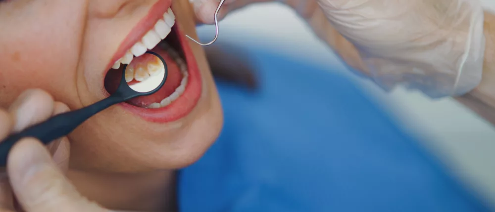 close-up-of-young-woman-at-dental-examination-in-an-ambulance