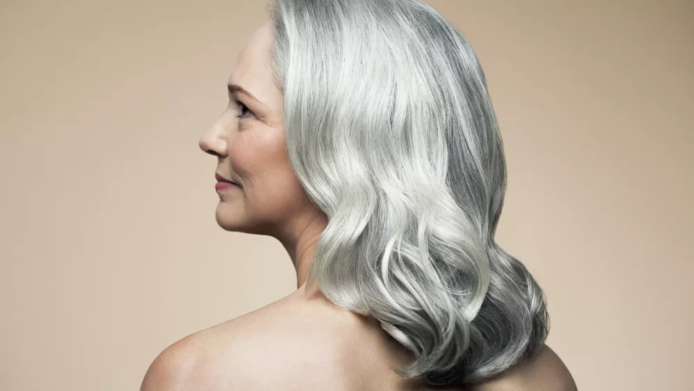 mature-woman-with-grey-hair-rear-view-profile