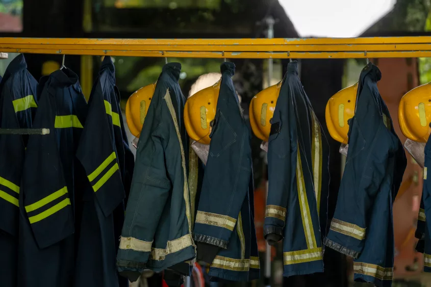 firefighter-protection-clothes-hanging-in-the-fire-station