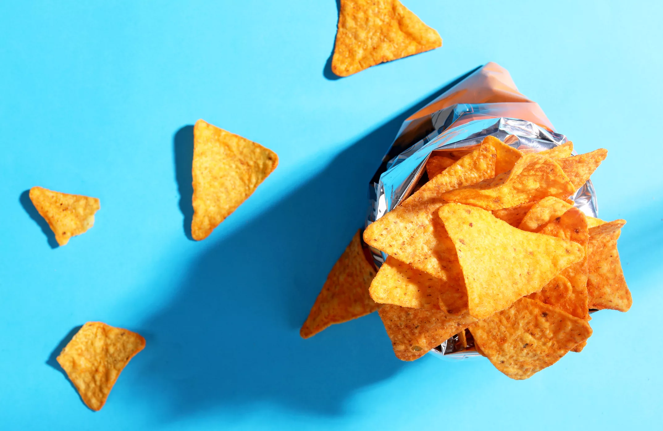 bag-chips-doritos-on-blue-background