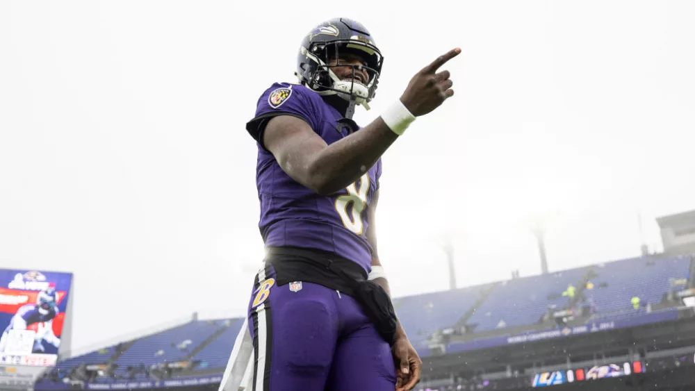 BALTIMORE, MARYLAND - DECEMBER 10: Lamar Jackson #8 of the Baltimore Ravens reacts prior to an NFL football game between the Baltimore Ravens and the Los Angeles Rams at M&T Bank Stadium on December 10, 2023 in Baltimore, Maryland. (Photo by Michael Owens/Getty Images)