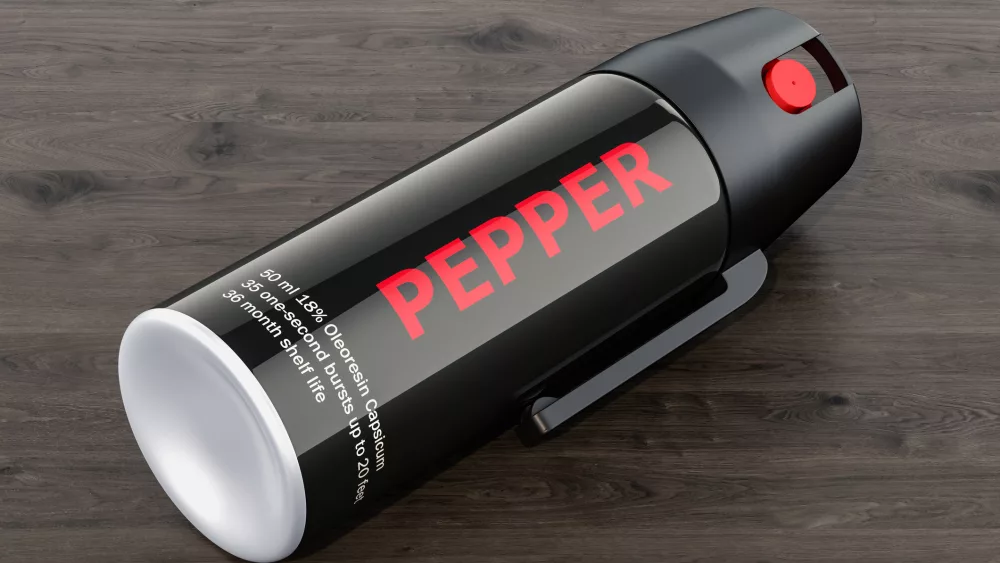 pepper-spray-on-the-wooden-table-3d-rendering