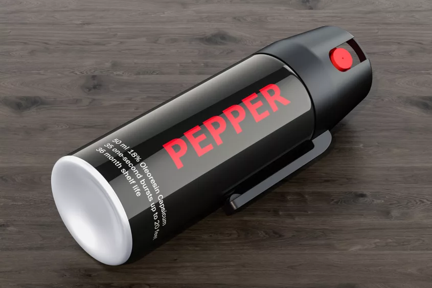 pepper-spray-on-the-wooden-table-3d-rendering