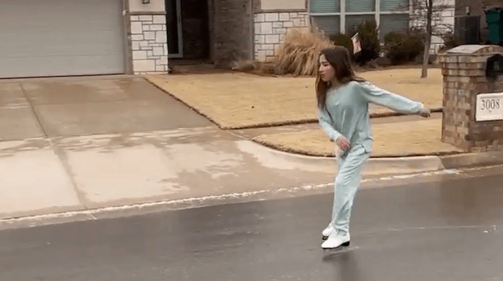 girl-skates-on-icy-road-65aea0252e1d1176841