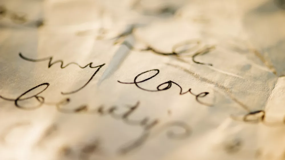 close-up-of-antique-love-letter-on-parchment