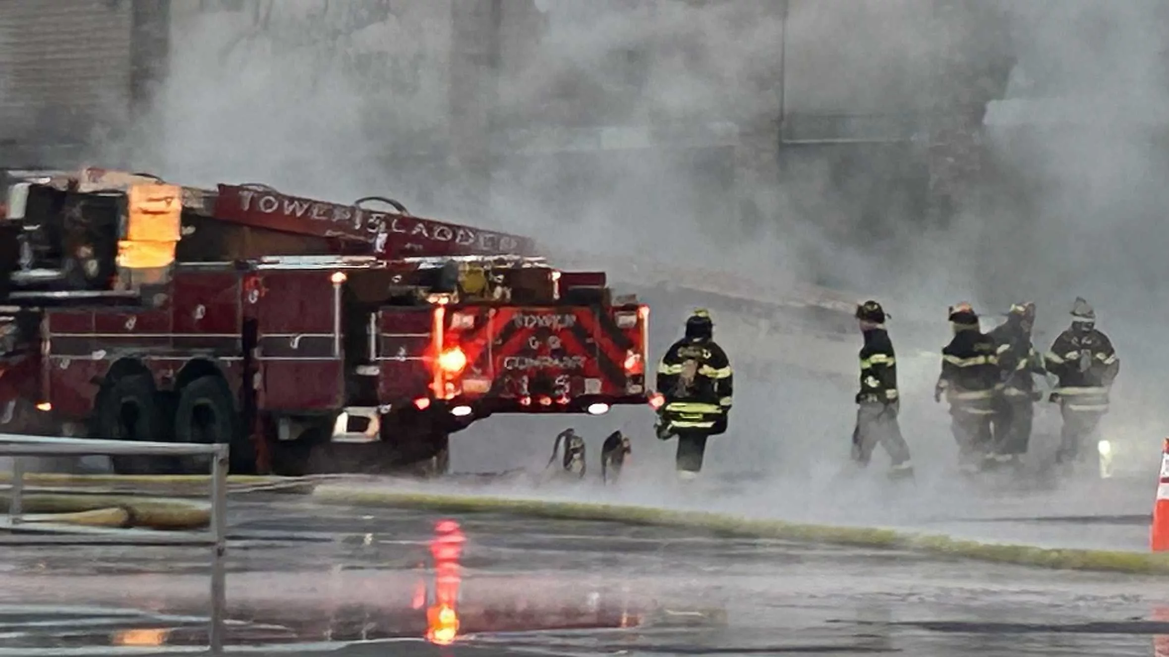 firefighters-at-martins-grocery-store-fire-65ce290e0acb4304117