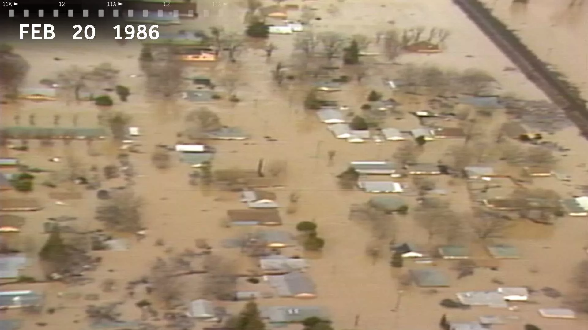 flood1986-still001-65d35c1b4676e9403