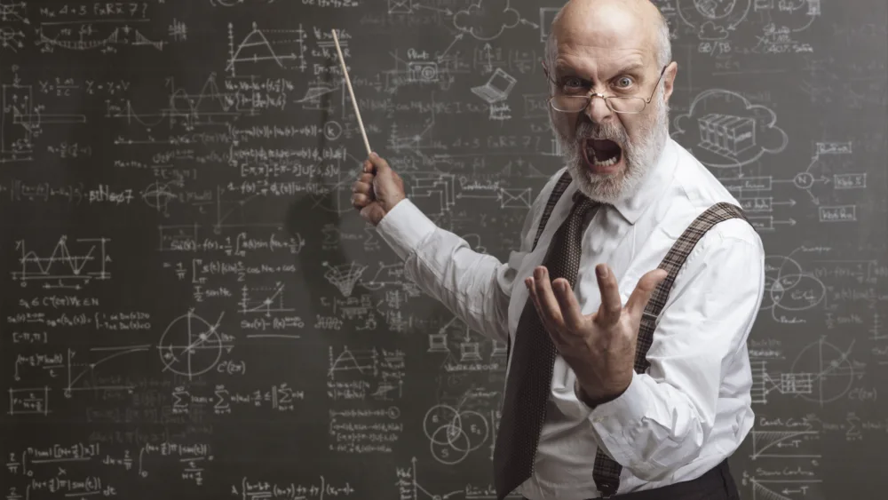 crazy-angry-professor-yelling-and-pointing-with-a-stick
