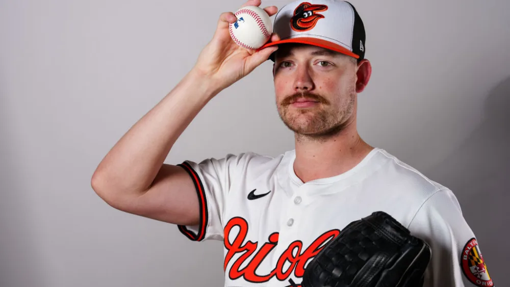 SARASOTA, FL - FEBRUARY 21: Kyle Bradish #38 of the Baltimore Orioles poses for a photo during the Baltimore Orioles Photo Day at Ed Smith Stadium on Wednesday, February 21, 2024 in Sarasota, Florida. (Photo by Daniel Shirey/MLB Photos via Getty Images)