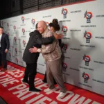 Fat Joe and Chuck D embrace: Chuck D, Valerie June, and Fat Joe attend the Power to the Patients Foo Fighters concert advocating for healthcare price transparency at The Anthem on March 05, 2024 in Washington, DC. (Photo by Katarina Hein/Hearst Entertainment)