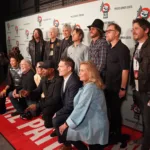 ) Dave Grohl, Josh Freese, Pat Smear, Chris Shiflett, Rami Jaffee and Nate Mendel of The Foo Fighters and Paul Morra join (Front Row L-R) Valerie June, photographer Henry Diltz, Rep. Mariannette Miller-Meeks (R-IA), Chuck D, Kevin Morra and Cynthia Fisher at the Foo Fighters' Power to the Patients concert at The Anthem on March 05, 2024 in Washington, DC. (Photo by Katarina Hein/Hearst Entertainment)