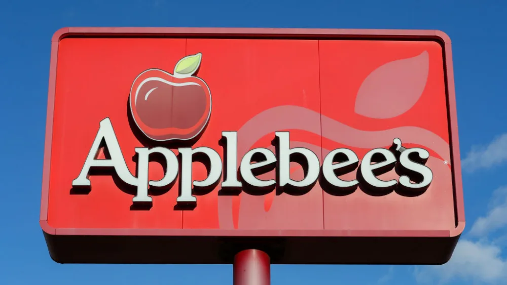 a-view-of-an-applebees-restaurant-sign-and-logo