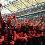 GERMANY-MUSIC-AC/DC: Fans of Australian rock band AC/DC cheers at their "PowerUp Tour 2024" at the VELTINS-Arena in Gelsenkirchen, western Germany on May 17, 2024. (Photo by INA FASSBENDER / AFP) (Photo by INA FASSBENDER/AFP via Getty Images)