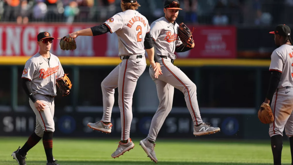 CHICAGO, ILLINOIS - MAY 26: Gunnar Henderson #2 and Colton Cowser #17 of the Baltimore Orioles celebrate after defeating the Chicago White Sox 4-1 at Guaranteed Rate Field on May 26, 2024 in Chicago, Illinois. (Photo by Michael Reaves/Getty Images)