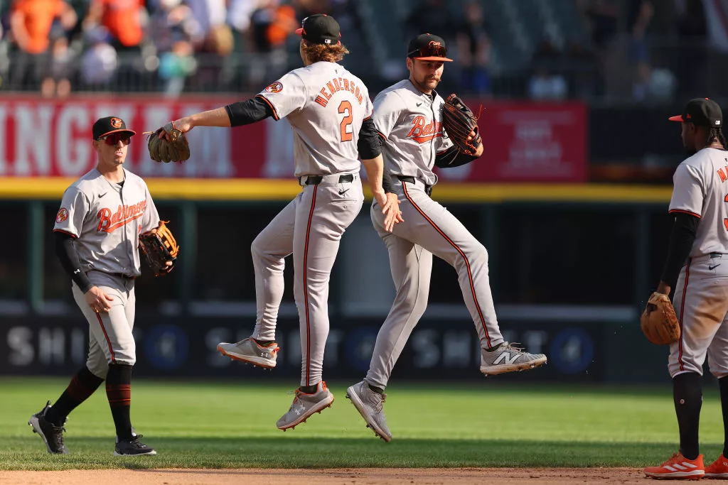 CHICAGO, ILLINOIS - MAY 26: Gunnar Henderson #2 and Colton Cowser #17 of the Baltimore Orioles celebrate after defeating the Chicago White Sox 4-1 at Guaranteed Rate Field on May 26, 2024 in Chicago, Illinois. (Photo by Michael Reaves/Getty Images)