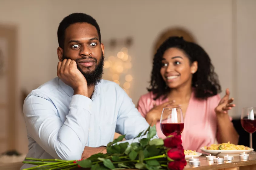 black-man-on-unsuccessful-first-date-in-restaurant