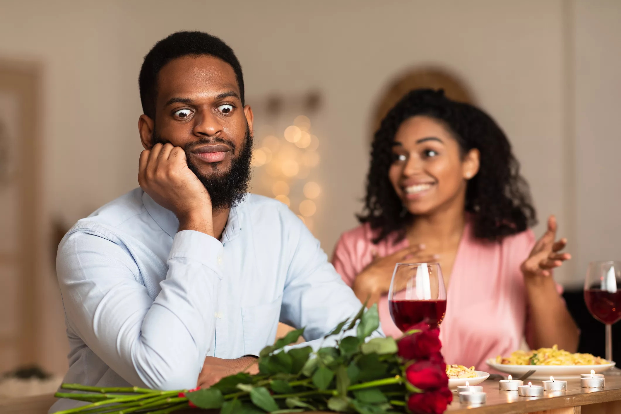 black-man-on-unsuccessful-first-date-in-restaurant