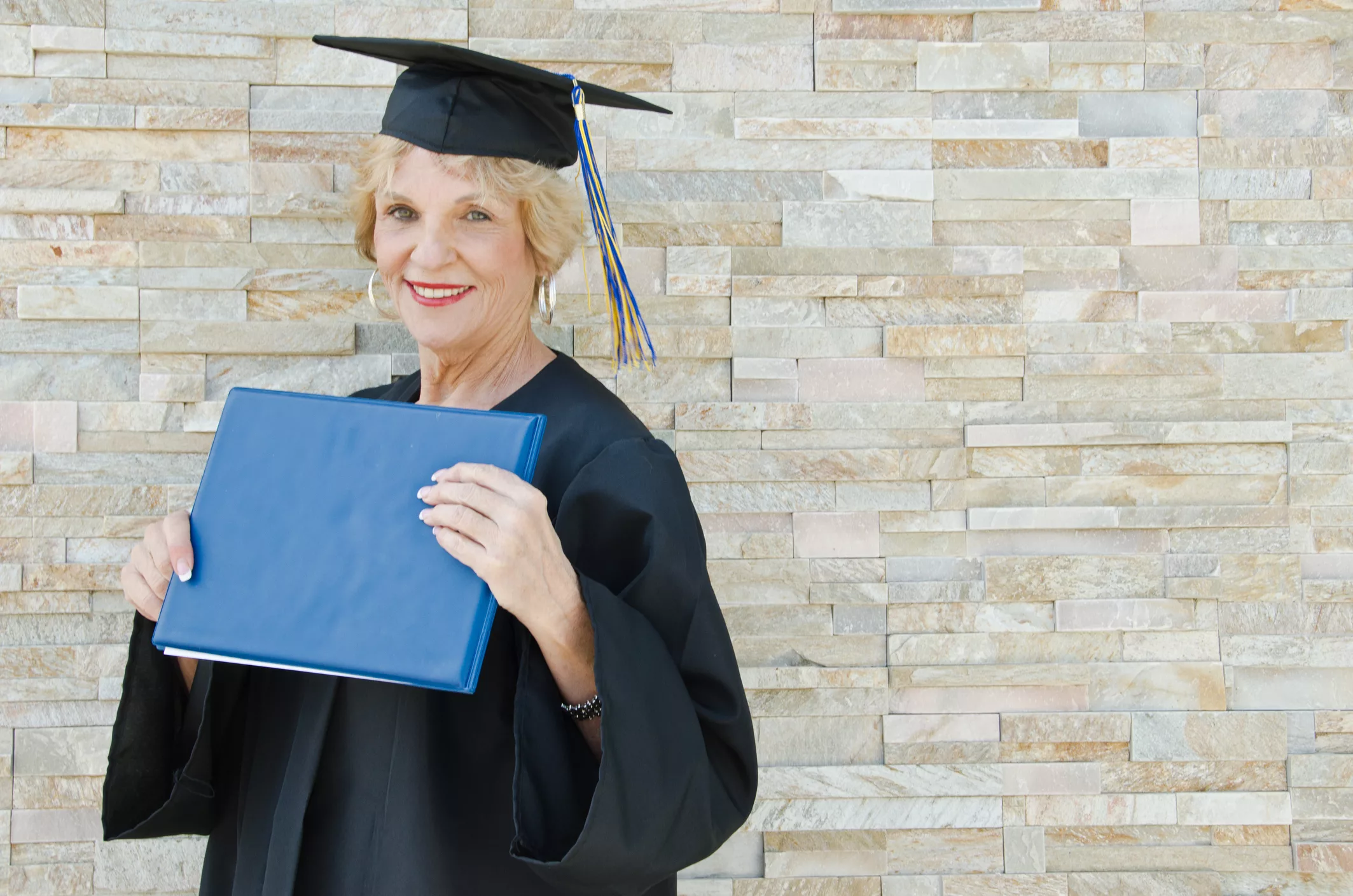 happy-senior-graduate-with-diploma