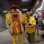 dsc02833: Scott Reardon, and the Orioles' Mustard Condiment Mascot pose ahead of the June 28 98 Rock Night Hot Dog Race. (Photo Credit: Katarina Hein - Hearst)