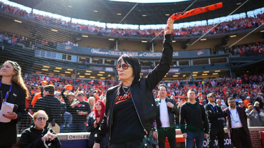 BALTIMORE, MD - OCTOBER 07: Joan Jett waves a rally towel prior to Game 1 of the Division Series between the Texas Rangers and the Baltimore Orioles at Oriole Park at Camden Yards on Saturday, October 7, 2023 in Baltimore, Maryland. (Photo by Rob Tringali/MLB Photos via Getty Images)