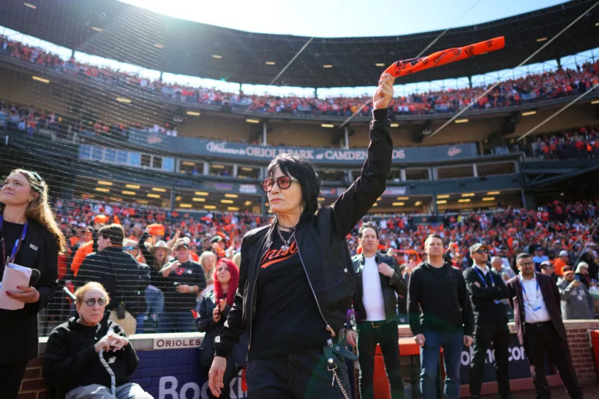 BALTIMORE, MD - OCTOBER 07: Joan Jett waves a rally towel prior to Game 1 of the Division Series between the Texas Rangers and the Baltimore Orioles at Oriole Park at Camden Yards on Saturday, October 7, 2023 in Baltimore, Maryland. (Photo by Rob Tringali/MLB Photos via Getty Images)