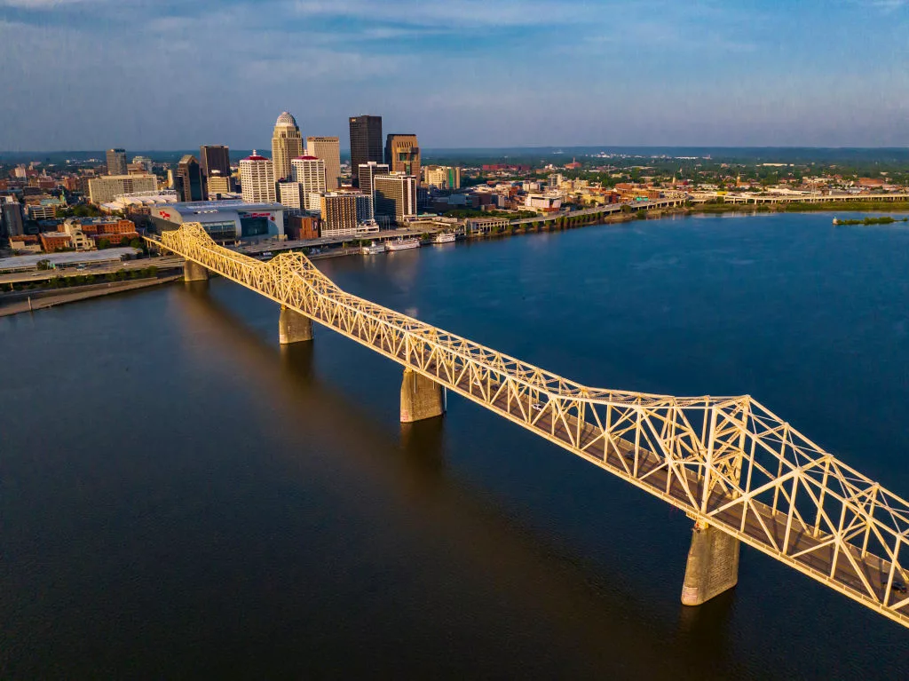 clark-memorial-seen-from-indiana-at-sunrise-to-sunset-to-dusk-view-crosses-ohio-river-to-louisville-kentucky