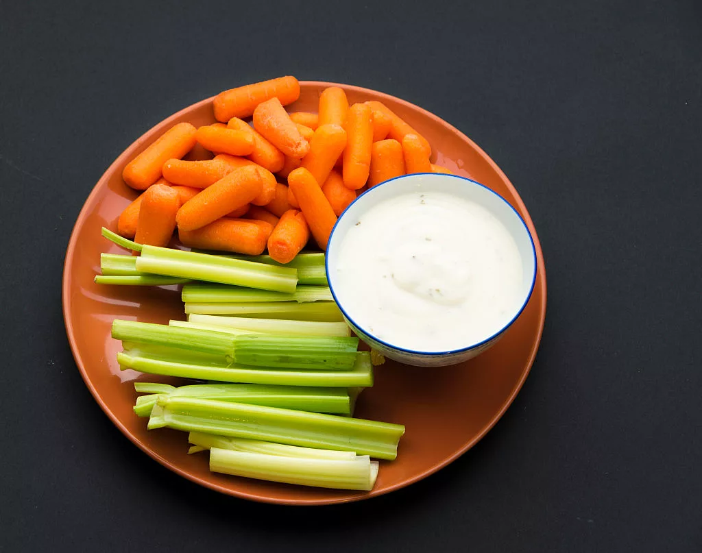 baby-carrots-celery-sticks-and-a-bowl-full-of-delicious