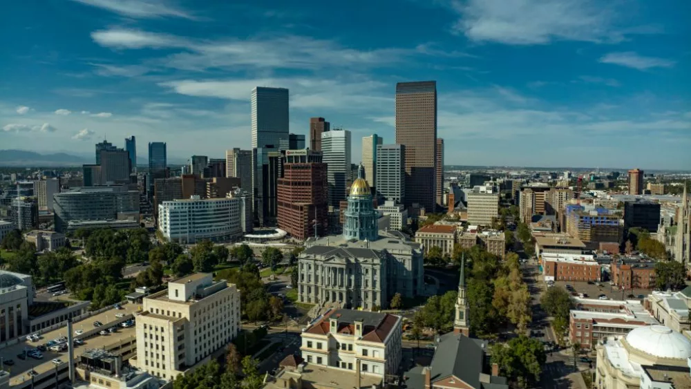 aerial-view-of-denver-skyline-and-state-capitol-dome-at-sunset