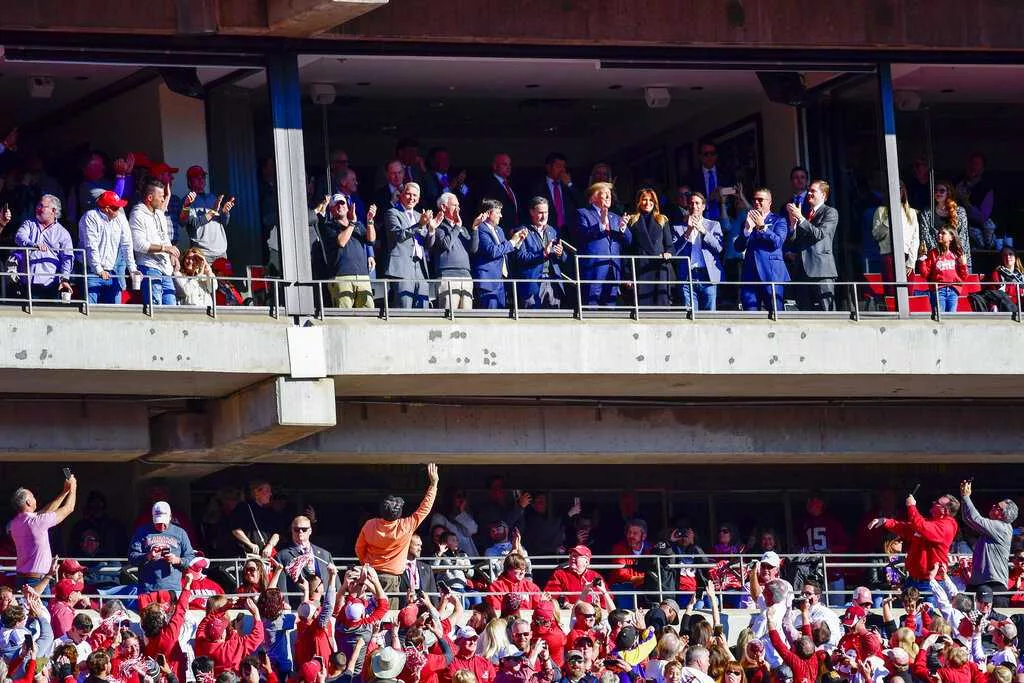 Donald Trump going to vs. Alabama game in Tuscaloosa 98 Rock