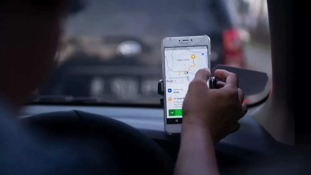 an-on-line-taxi-driver-seen-using-gps-navigate-which-was