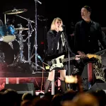 FIREAID Benefit Concert For California Fire Relief - Kia Forum: Kim Gordon (C) performs onstage with (L-R) Dave Grohl and Krist Novoselic of Nirvana  (Photo by Scott Dudelson/Getty Images for FIREAID)