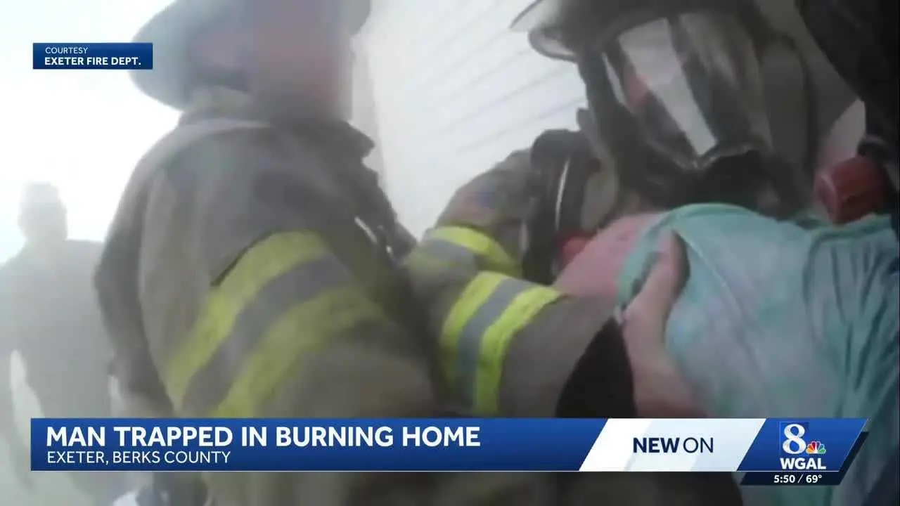 WATCH: Firefighter rescues man in wheelchair from burning home | 98 ...