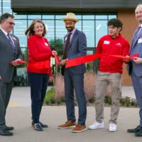 (L-R) Sandburg President Dr. Seamus Reilly^ Vice President of Academic Services Carrie Hawkinson^ Board of Trustees Chairperson DeVone Eurales^ Student Trustee Zair Ruiz-Velazquez and Sandburg Foundation Board President Chad Long cut the ribbon at the grand opening for the college’s Science & Technology Center on Tuesday. The $27 million^ 46^733-square-foot facility is the first new building on Sandburg’s Galesburg campus since 2006 and the most impactful project there since its primary construction in 1969.