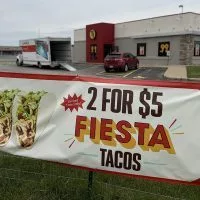 Taco John's^ a quick service restaurant known for its Mexican-inspired cuisine^ has permanently closed its doors at 1922 N. Henderson St. Workers were at the store Sunday morning moving equipment from the store into a UHaul truck.