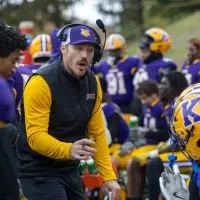 Knox College head football coach Aaron Willits on the sideline with the Prairie Fire. Willits announced his resignation on Nov. 17^ 2025^ after five seasons leading the program. (KNOX COLLEGE PHOTO)