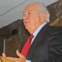 Joseph A. “Joe” Angotti speaking at a podium