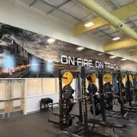 New weight room at Galesburg High School featuring 16 stations and individualized training programs