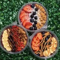 Three açaí bowls from Açaí with Me^ a new mobile food truck in Galesburg^ Illinois