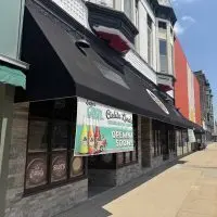 Exterior of Cielito Lindo Restaurante Bar y Cantina under a black awning in downtown Galesburg