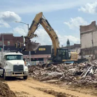 USA Recycling continues cleanup and hauling materials from the site on Main and Prairie streets today to an EPA approved temporary sorting location at 1480 S. Henderson St.