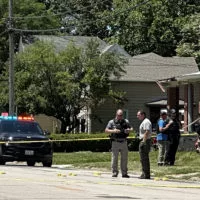 Members of the Galesburg Police Department and the Illinois State Police Crime Scene Investigator remain on the scene of a shooting in the 900 block of East South Street that occurred Friday Morning^ June 7^ 2024.